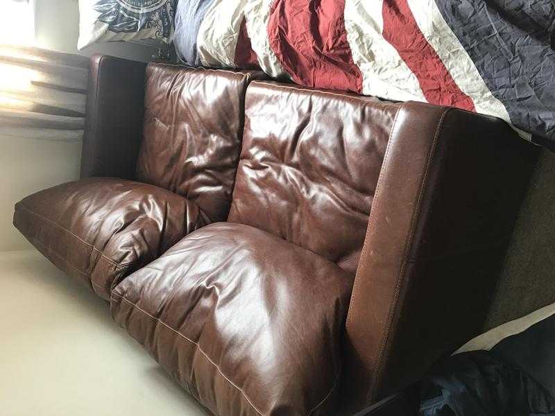 Tab leather sofa bed