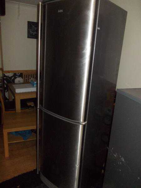 tall AGE fridge freezer stainless steel frost free in vgc .free local delivery