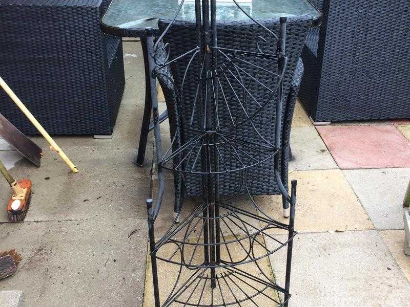 Tall black metal plant stand