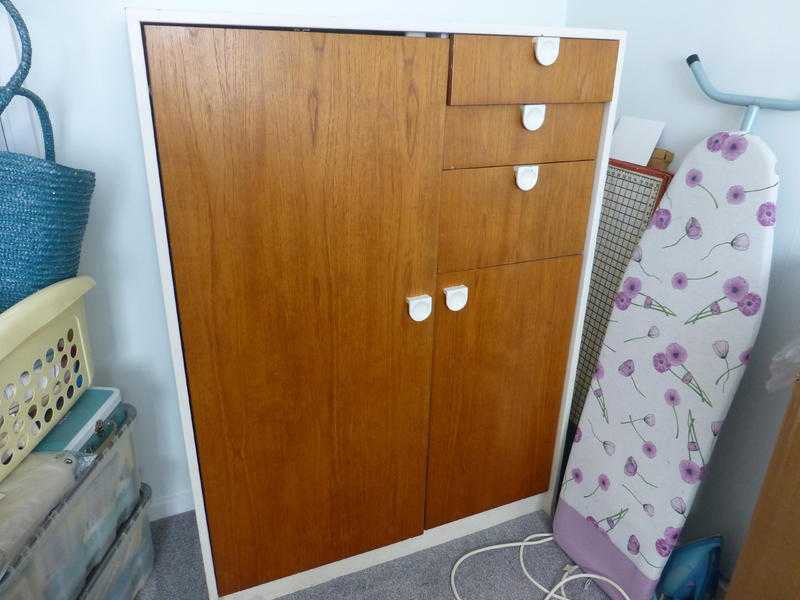 Tall-Boy teak amp white wardrobe (1970039s) ideal for a small bedroom.