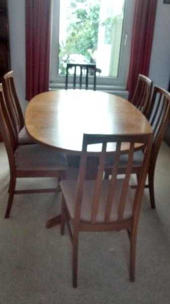 Teak extendable dining table and 6 matching chairs