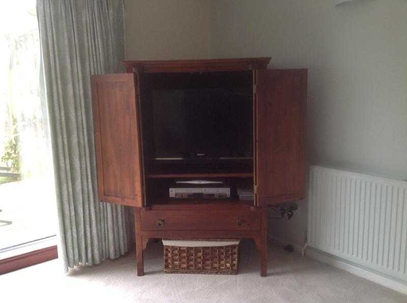 Television cupboard with drawer.