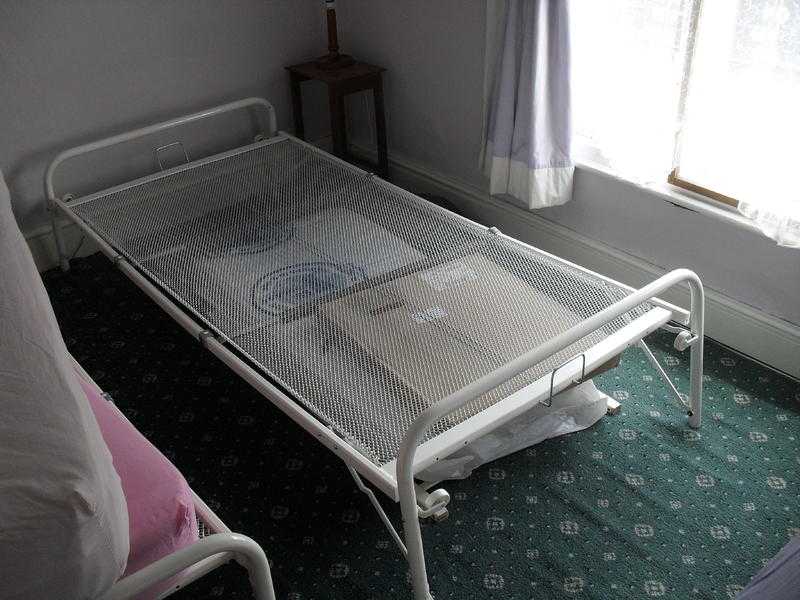 Three Light weight single beds. Legs fold or come off for storage.