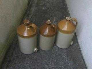 three old earthenware jugs 25 the three