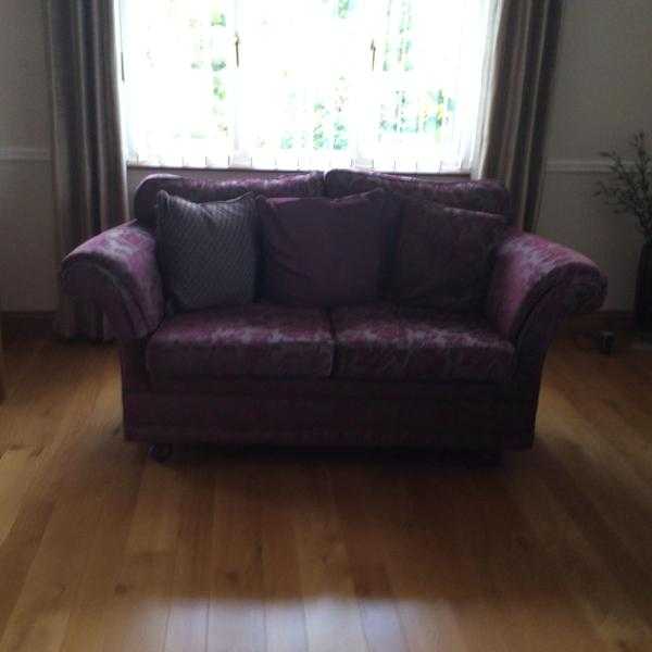 three piece suite one small two seeter  sofa one large sofa. One chair