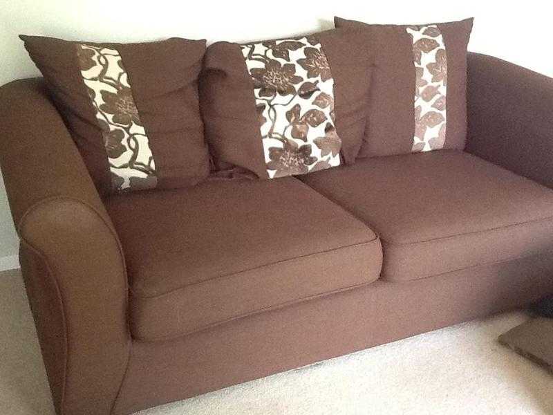 Three seater brown sofa