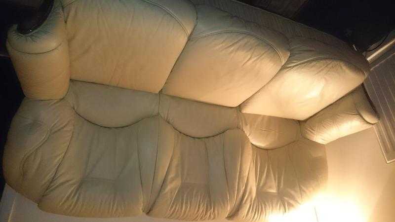 Three seater cream sofa