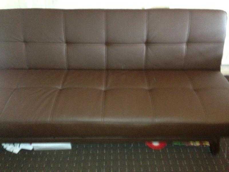 Three seater leather sofa bed
