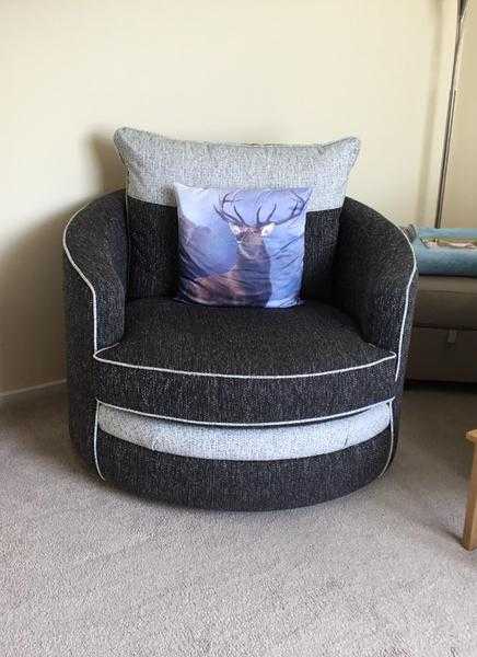 Three seater settee and twister chair.