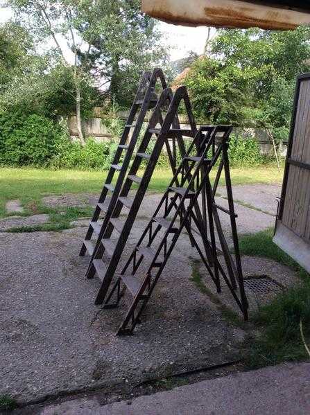 Three vintage ladders