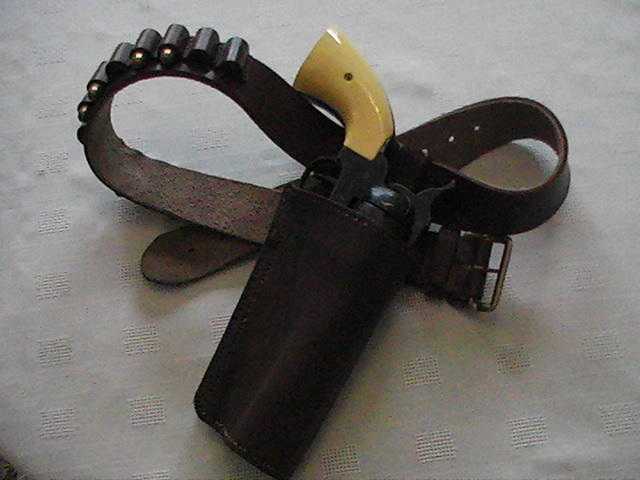 Toy Pistol and Holster set with Dummy Shells in the Holster. .38 Cal