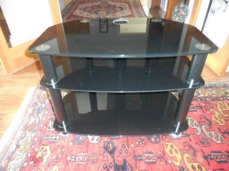 TV STAND BLACK GLASS - NEAR NEW CONDITION