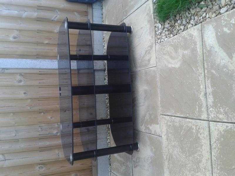 tv stand toughened glass black in perfect condition will take 50 inch  or below