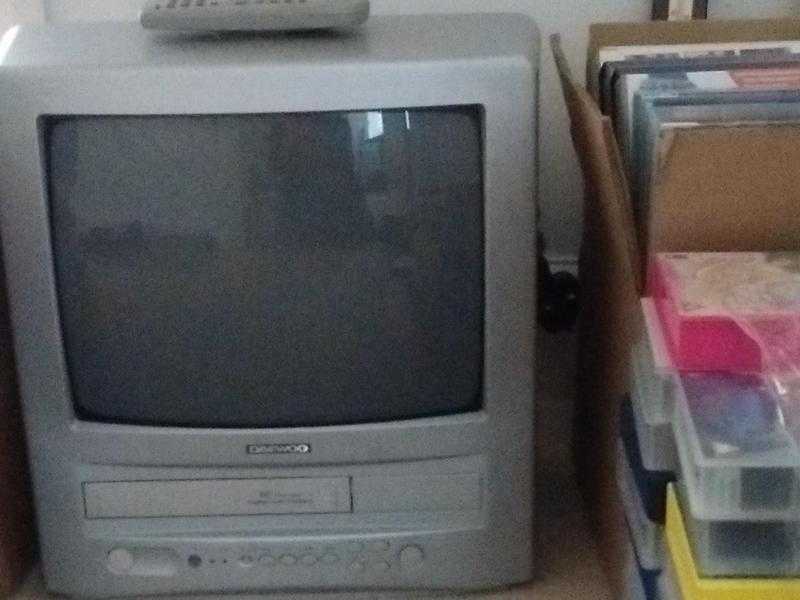 TVVHS Television Combo with VHS tapes