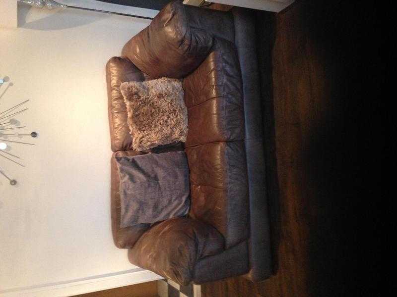 Two and three seater brown leather suite