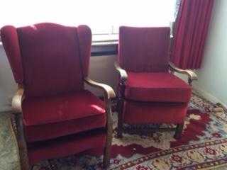 Two beautiful matching armchairs with wood armrests