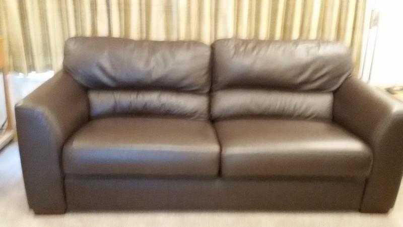 Two brown leather sofas