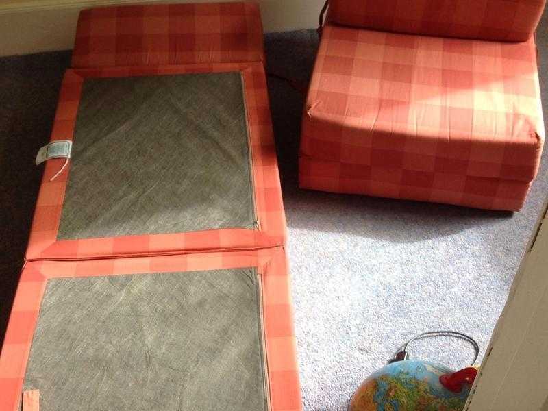 Two chair beds terracotta colour