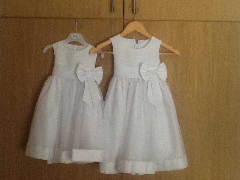 Two flower girl dresses