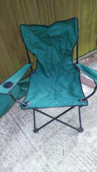 Two folding camp chairs in carry bags