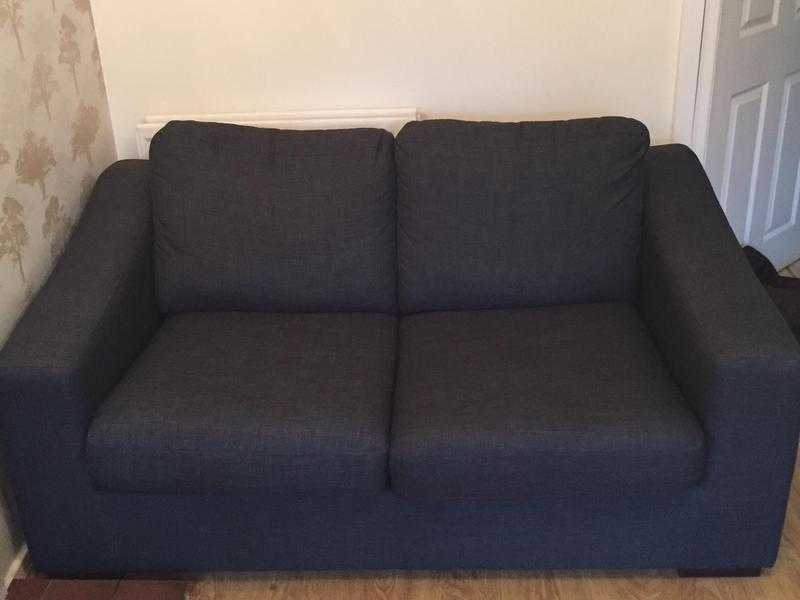 Two grey two seater sofas (one sofa bed)