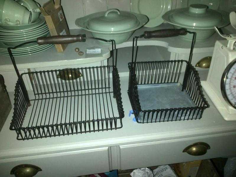 Two Ikea black metal kitchen sink dish utensils wire basket storage racks boxes holders