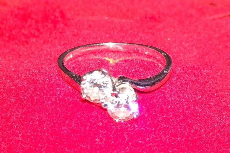 Two in a twist 18ct gold diamond ring