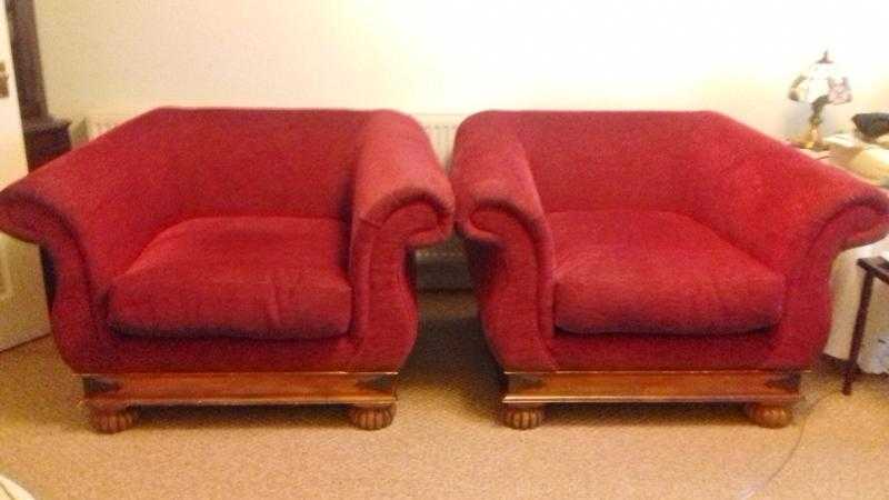 TWO LARGE STURDY KLAUSSNER ARMCHAIRS IN CHENILLE UPHOLSTERY FABRIC WITH SOLID SLOT ON WOODEN BASES