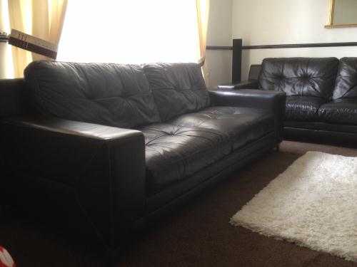 Two leather settees