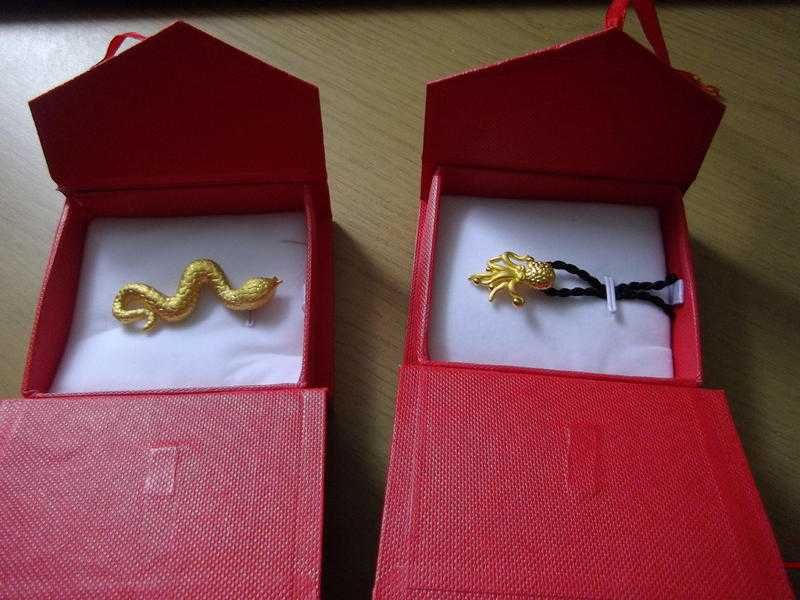 TWO PURE GOLD 24CT PENDANTS, SNAKE  OCTOPUS, SWINDON