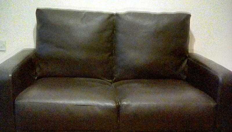 Two seat black leather sofa