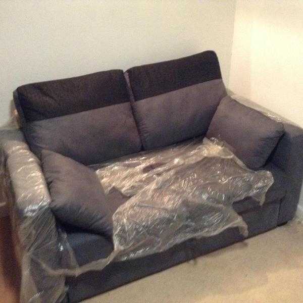 Two seater charcoal sofa bed pull out