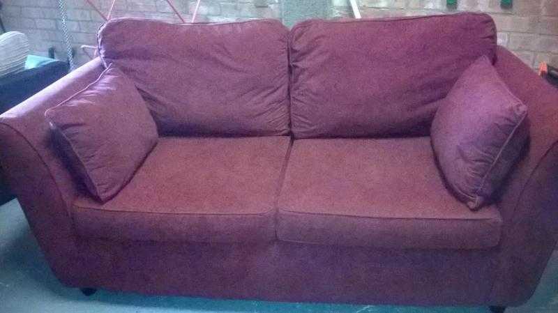 Two seater dark red sofa