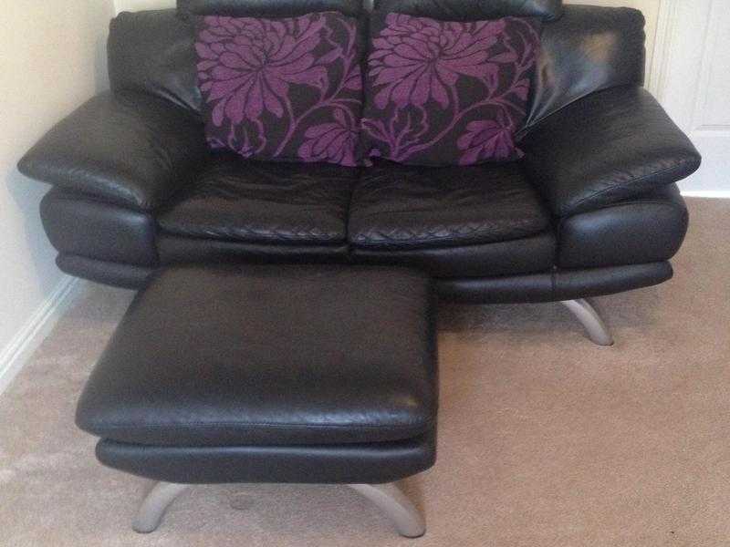 Two seater leather sofa with foot stool and recliner chair