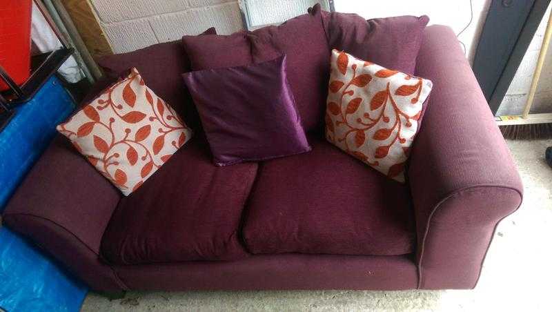 Two seater sofa, purple with scatter cushions