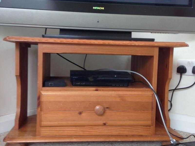 Two solid pine TV table units. One 18, the other 10