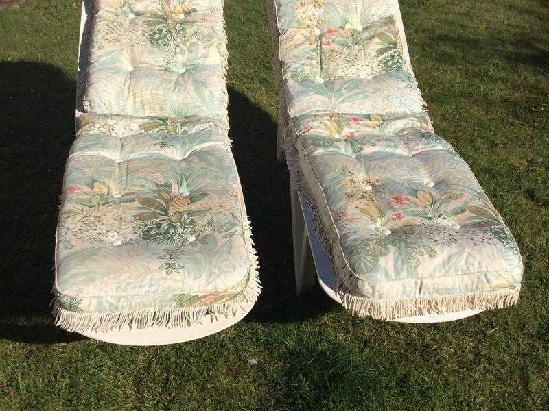 Two Sun loungers,with luxury cushions. Bases come on two pieces and has wheels so easy to manoeuvre.