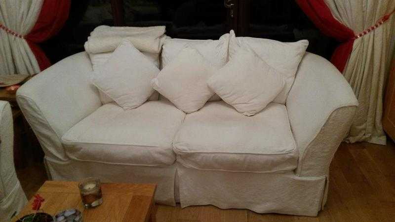 two three seater cream fabric sofas for sale