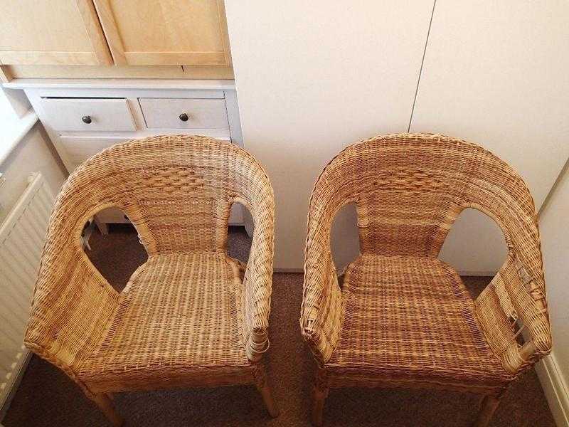 Two vintage style wicker chairs