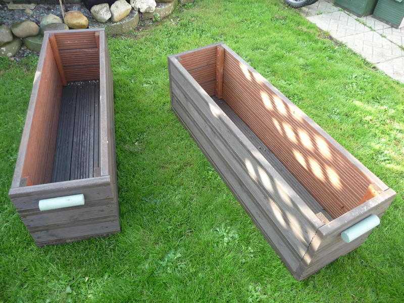 TWO WOODEN  GARDEN PLANTERS