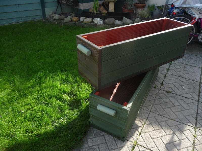 TWO WOODEN GARDEN PLANTERS
