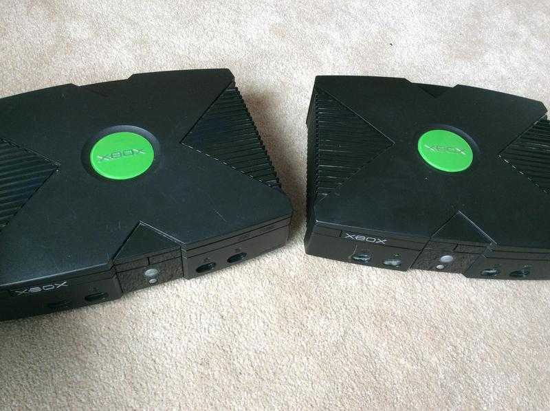 Two Xbox original consoles not working