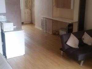 Unfurnished self contained studio flat with small private garden