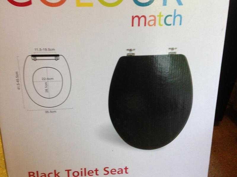 Unused Black Toilet Seat