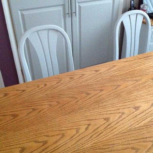 Up cycled table and four chairs