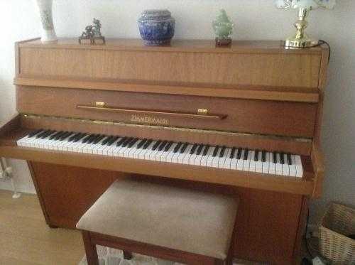 Upright piano and stool