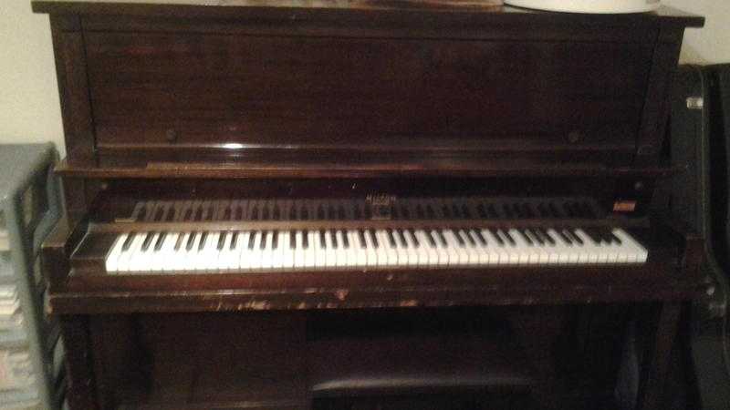 upright piano, free to collector.