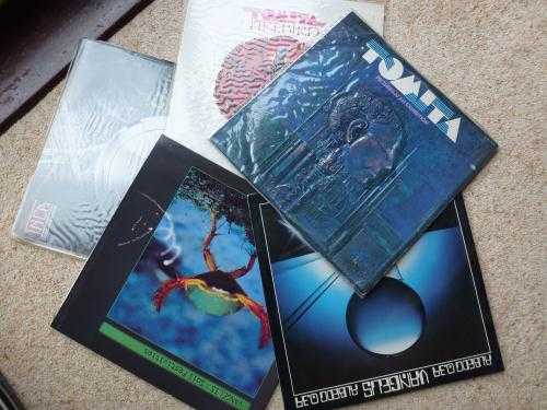 Vangelis and Tomita various records