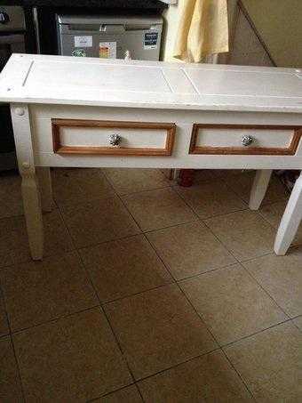 Vanity UnitSide Table. Good condition.  Two draws and porcelain handles. Willing to drop off locall