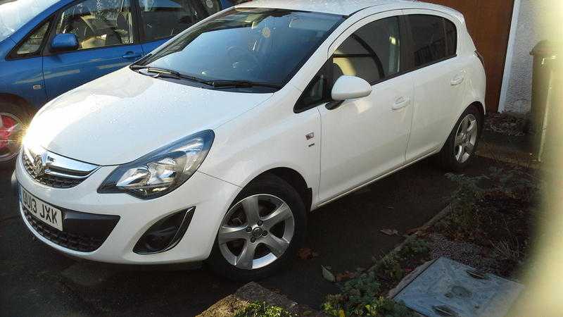 Vauxhall Corsa SXI 1.2 AC 2013 with fitted Parrot Asteroid Smart, just fully serviced and ready to go, owner selling due to moving abroad